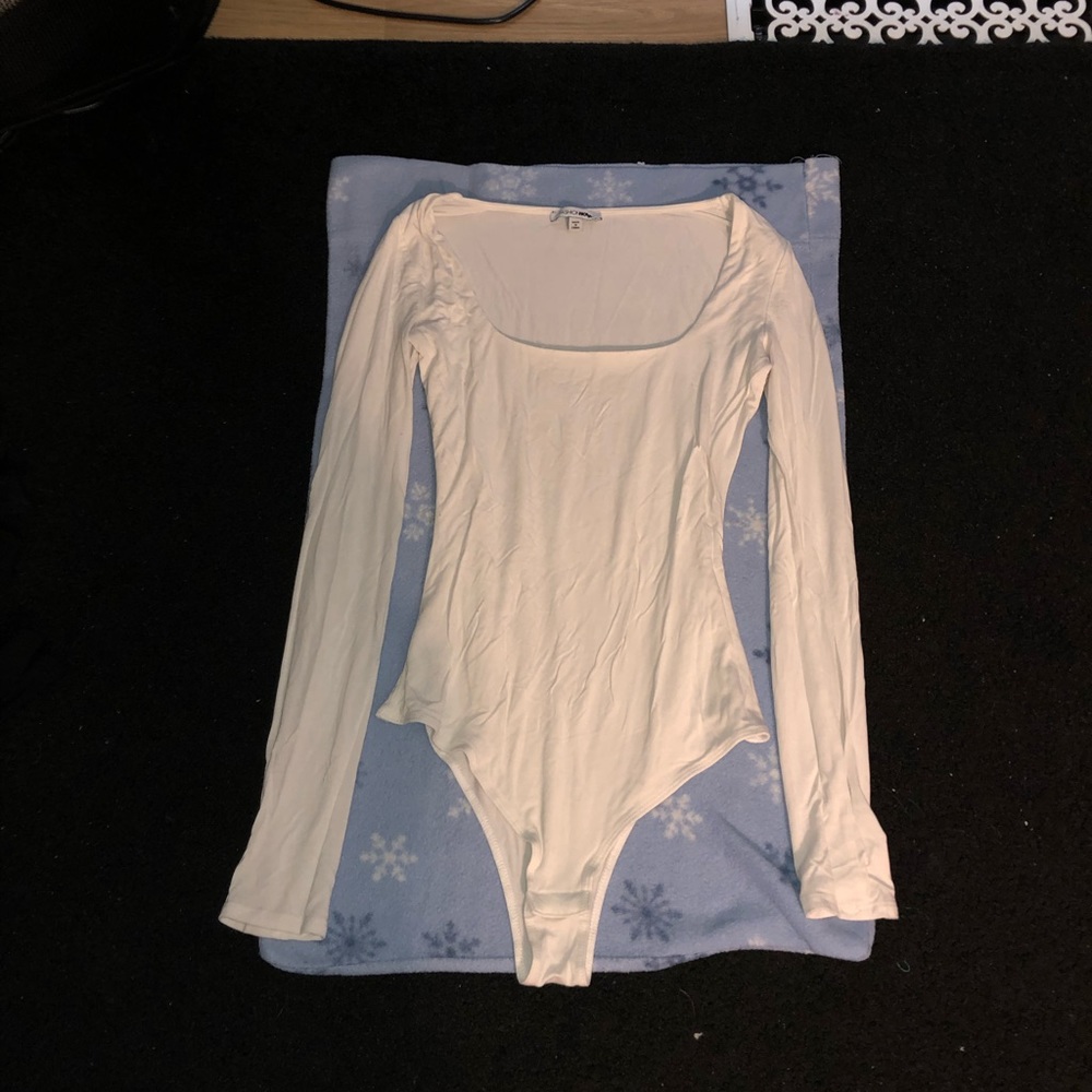 Fashion Nova White Low Cut Long Sleeve BodySuit